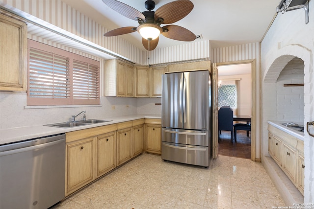 kitchen featuring ceiling fan, light brown cabinets, sink, light wood-type flooring, and stainless steel appliances