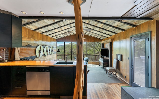 kitchen featuring vaulted ceiling with beams, sink, dishwasher, wood ceiling, and light colored carpet