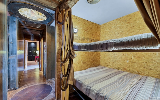 bedroom featuring dark wood-type flooring