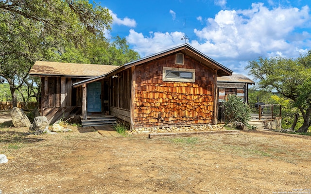 view of front of home with a wooden deck