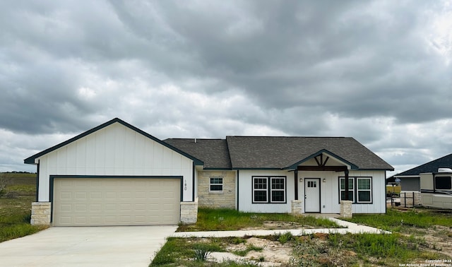 view of front of property featuring a garage