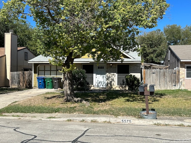 view of front of home with a front lawn