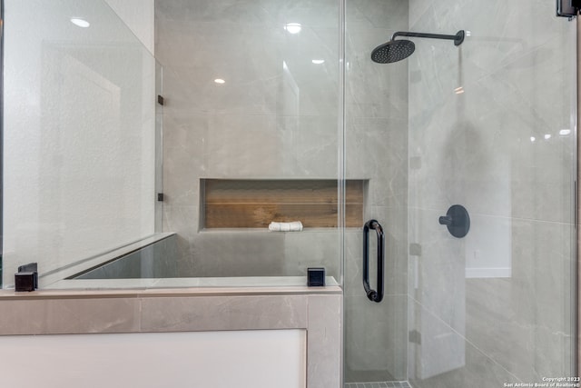 bathroom with an enclosed shower