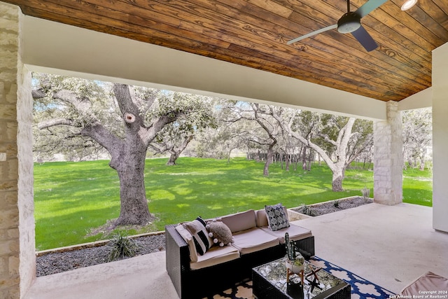 view of terrace featuring ceiling fan