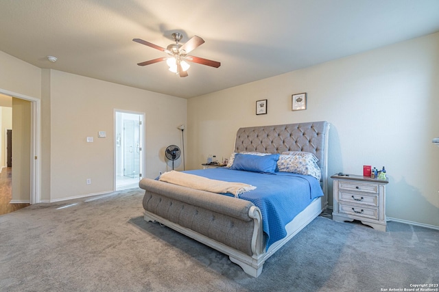 bedroom featuring ceiling fan and dark colored carpet