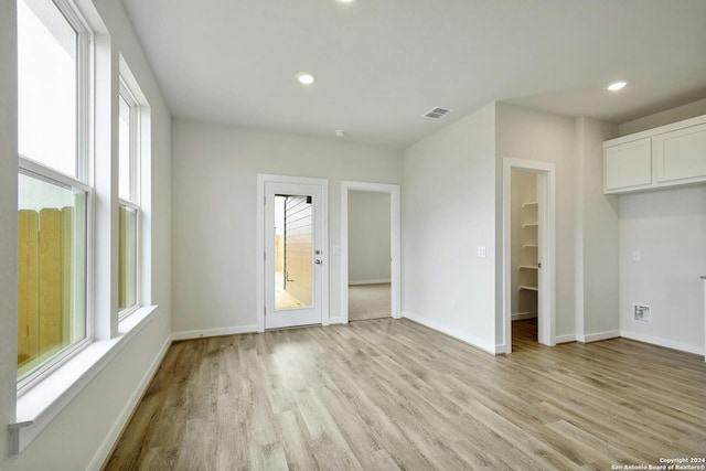 interior space with light hardwood / wood-style floors