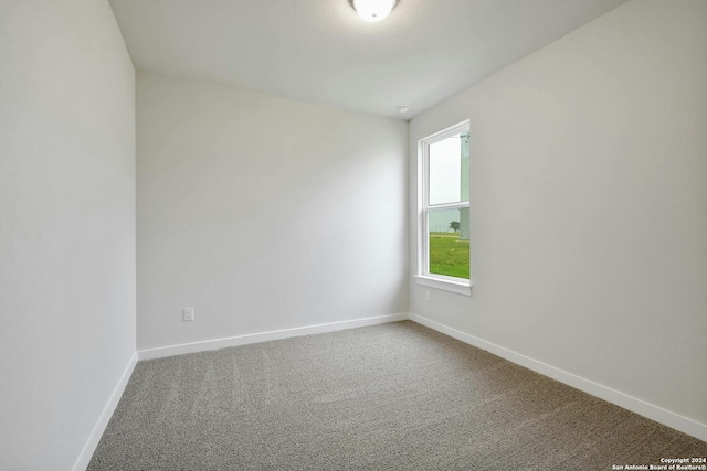 unfurnished room with carpet