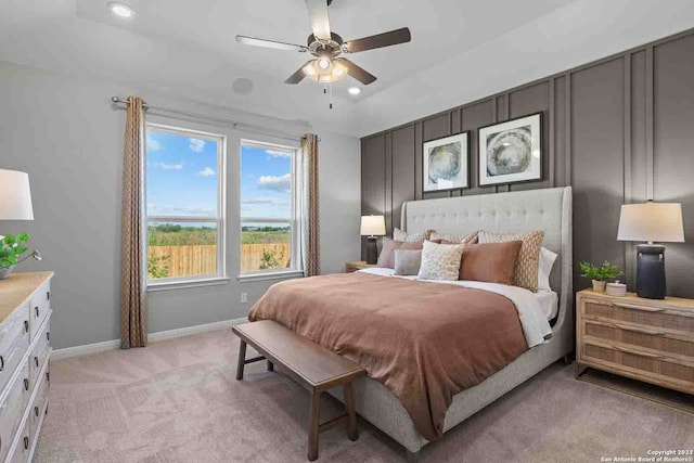 carpeted bedroom featuring ceiling fan