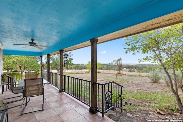 view of patio with ceiling fan