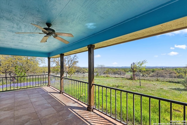 wooden terrace with ceiling fan