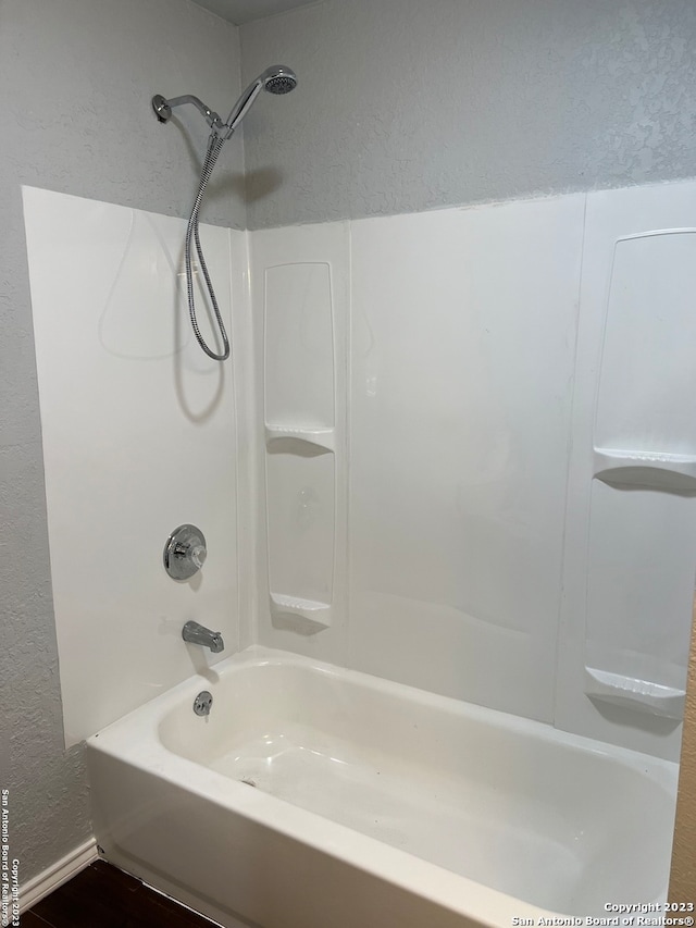 bathroom featuring shower / washtub combination