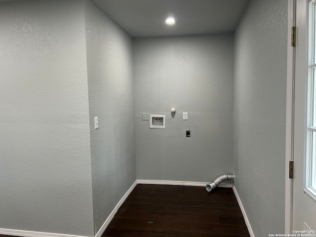 washroom with dark hardwood / wood-style flooring, electric dryer hookup, and hookup for a washing machine