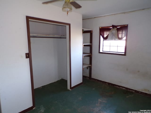 unfurnished bedroom with a closet and ceiling fan