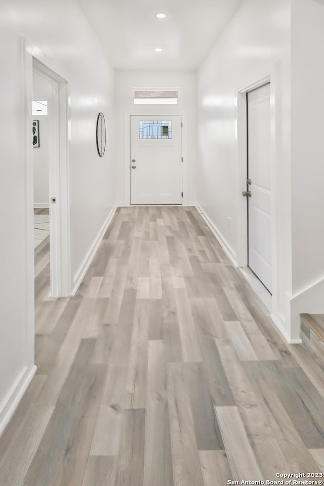 hallway featuring light hardwood / wood-style flooring