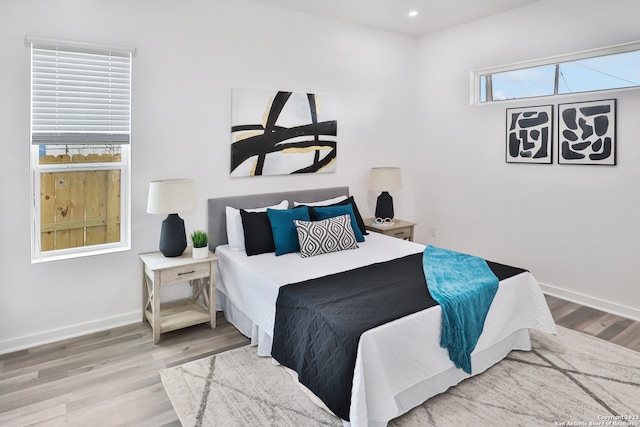 bedroom featuring light wood-type flooring