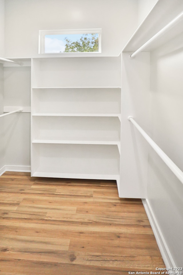 walk in closet featuring light wood-type flooring