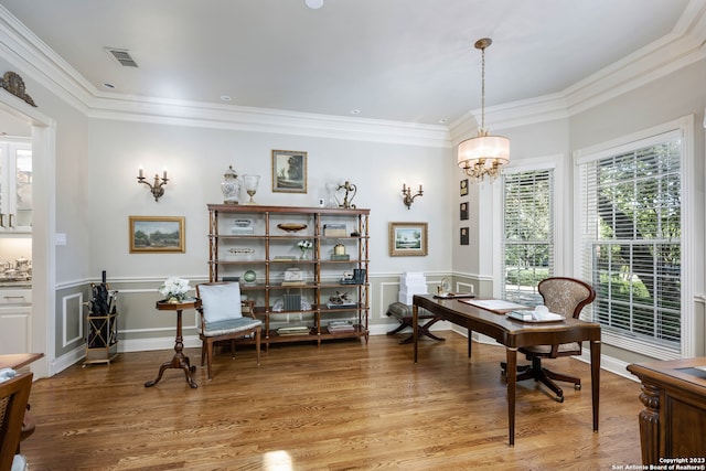 interior space featuring light hardwood / wood-style flooring, a notable chandelier, and plenty of natural light