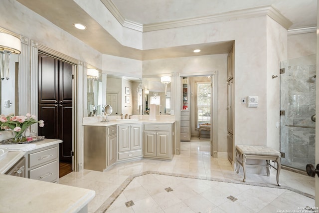 bathroom featuring double sink vanity, tile flooring, tiled shower, and crown molding