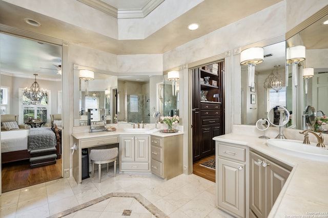 bathroom featuring tile floors, ceiling fan with notable chandelier, and a wealth of natural light