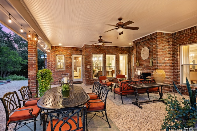 view of patio / terrace featuring ceiling fan and an outdoor living space