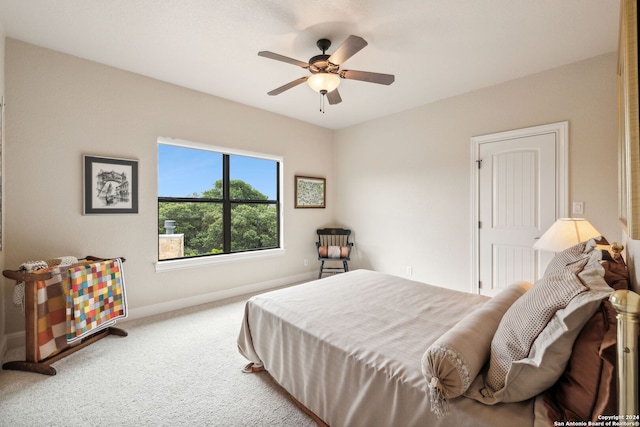 carpeted bedroom with ceiling fan