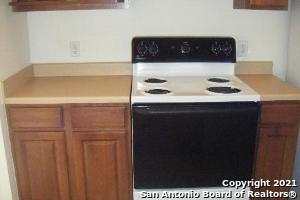 kitchen featuring white range with electric cooktop