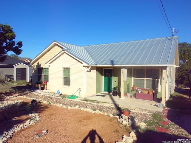 view of front of house with a patio area