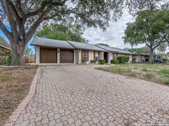 ranch-style house with a garage