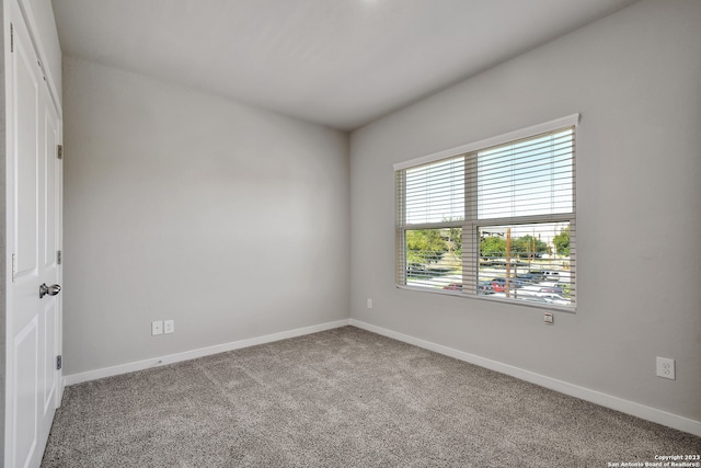 view of carpeted spare room