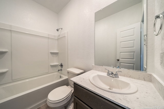 full bathroom featuring toilet, vanity, and bathing tub / shower combination