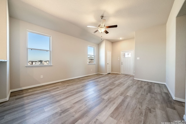 unfurnished room featuring ceiling fan and light hardwood / wood-style floors