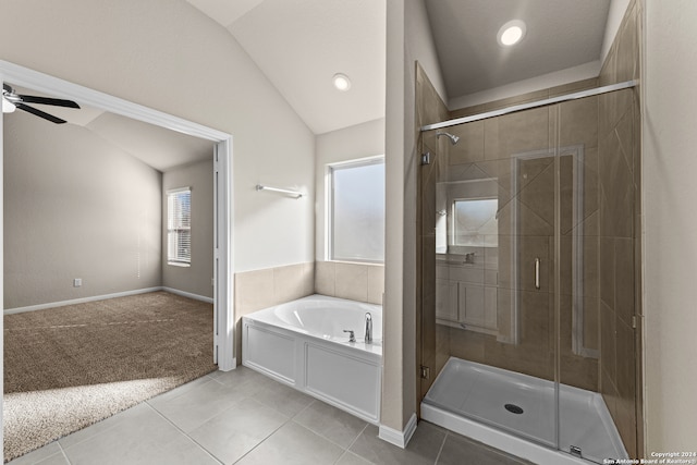 bathroom featuring plus walk in shower, lofted ceiling, tile patterned floors, and ceiling fan