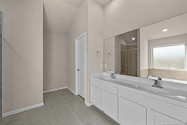 bathroom with vanity, separate shower and tub, and tile patterned flooring