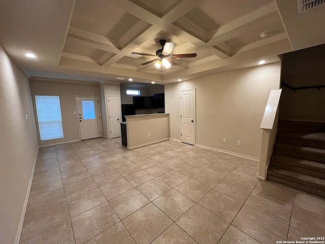 interior space featuring coffered ceiling, beam ceiling, and ceiling fan