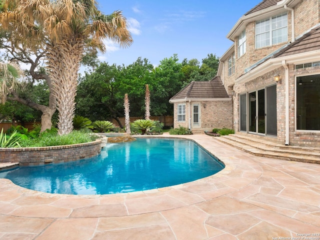 view of pool with a patio area