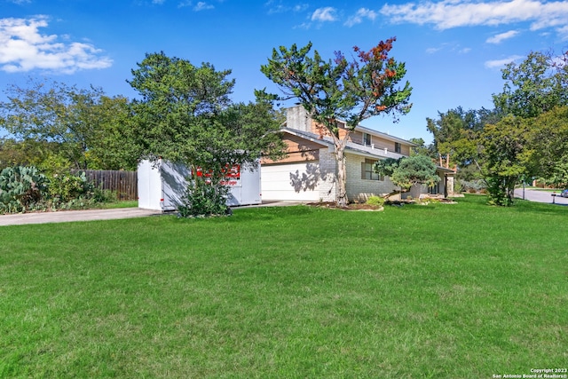 view of yard with a garage