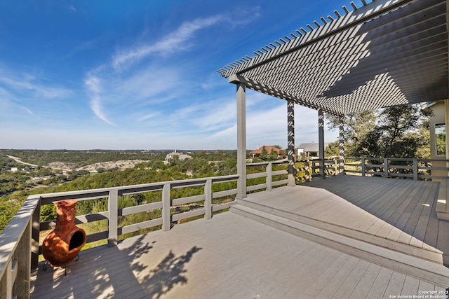 wooden deck with a pergola