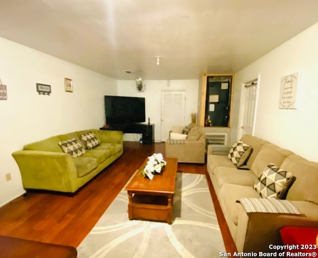 living room with hardwood / wood-style flooring