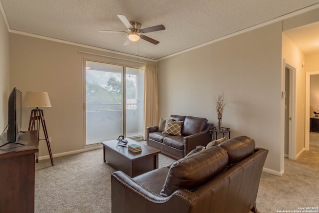 living room featuring light carpet, a textured ceiling, and ceiling fan