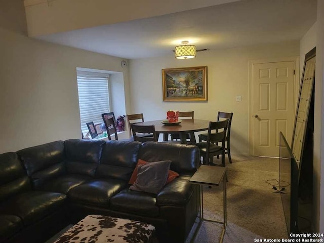 living room featuring carpet