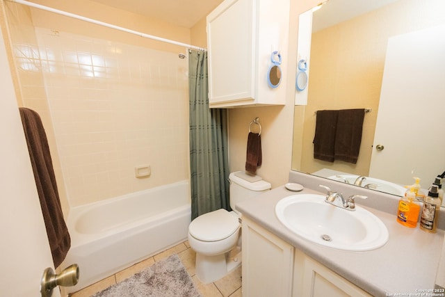 full bathroom featuring shower / bath combination with curtain, tile patterned floors, toilet, and vanity