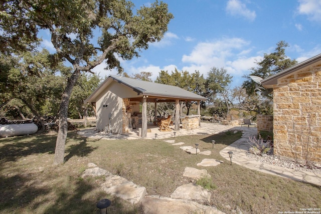 view of yard with a gazebo and a patio