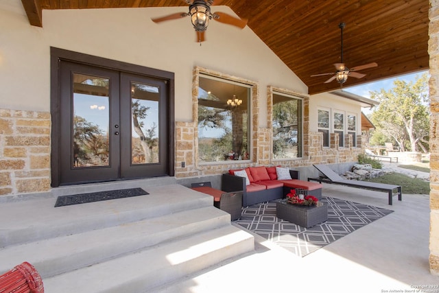 doorway to property featuring ceiling fan and french doors