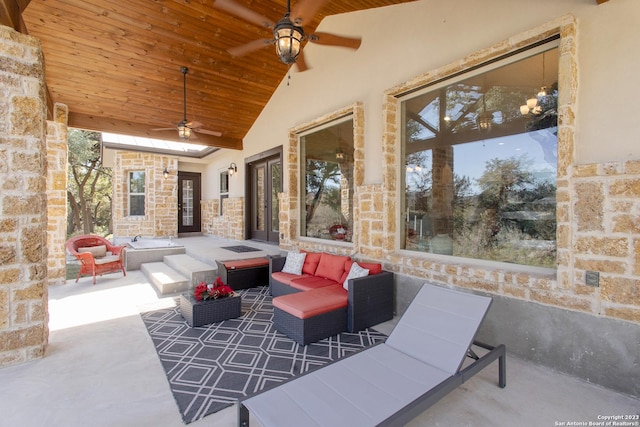 view of patio featuring an outdoor living space and ceiling fan