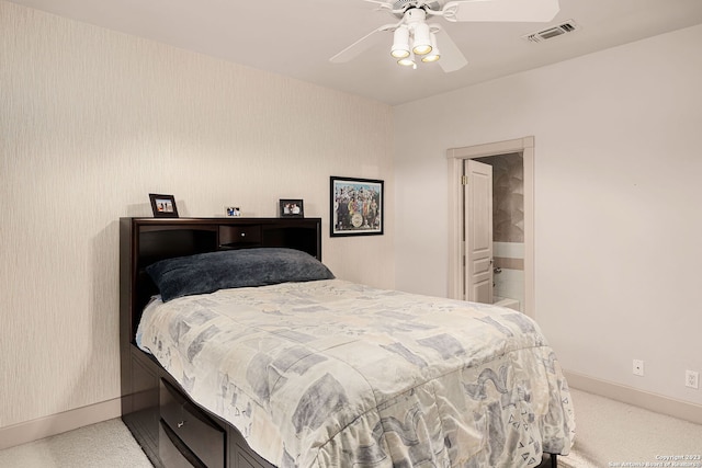 bedroom with ceiling fan and carpet