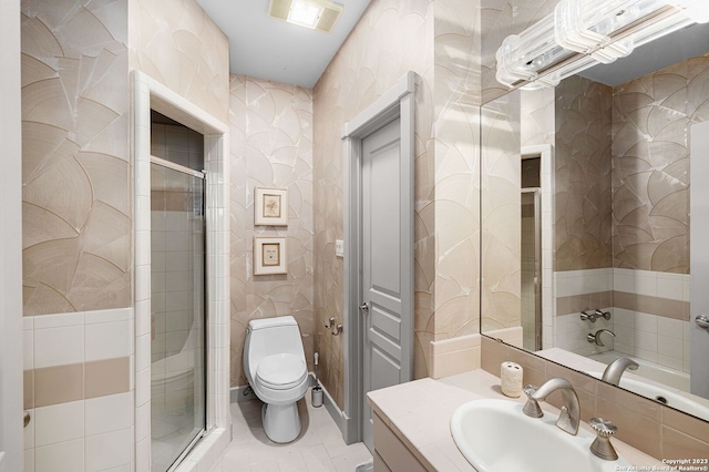 bathroom with vanity, toilet, and walk in shower