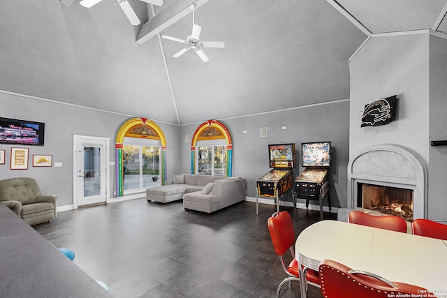 living room with beam ceiling, ceiling fan, and high vaulted ceiling