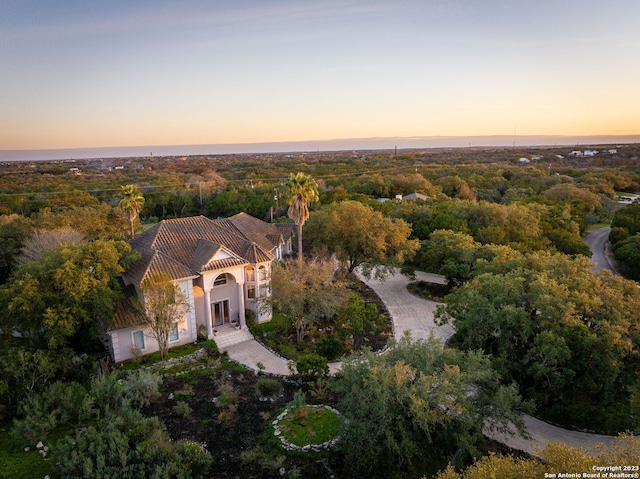 view of aerial view at dusk