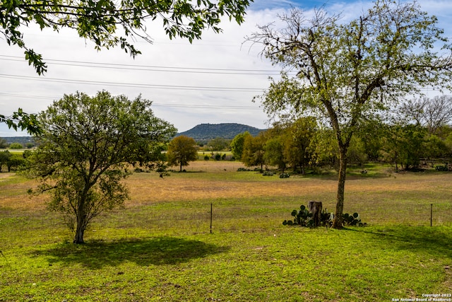 view of mountain feature featuring a rural view