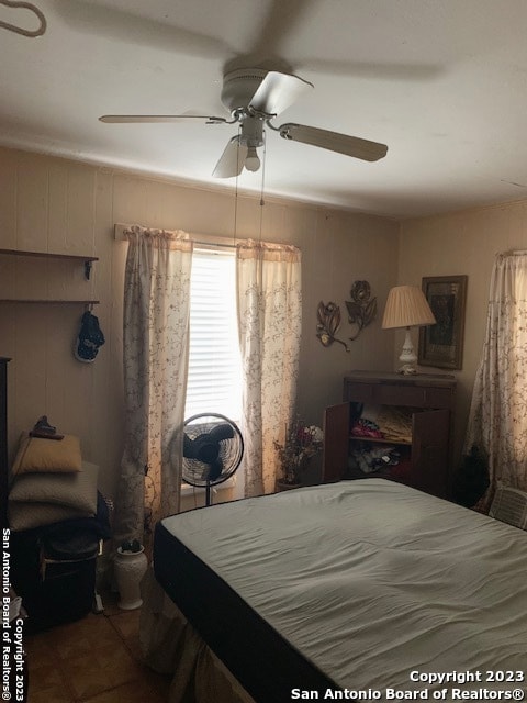 bedroom featuring ceiling fan